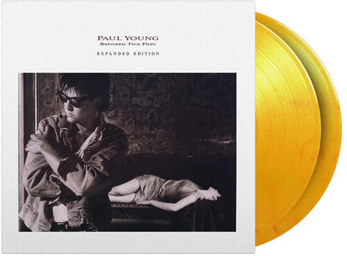 Paul Young: Between Two Fires - Limited & Expanded 180-Gram Flame Colored Vinyl [ Record ]